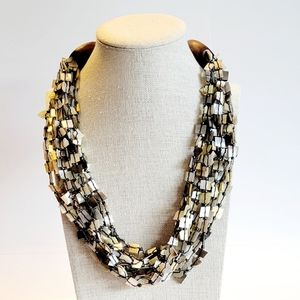 Statement Neclace, Artsy 12 strand mother of pearl with wood and button clasp.